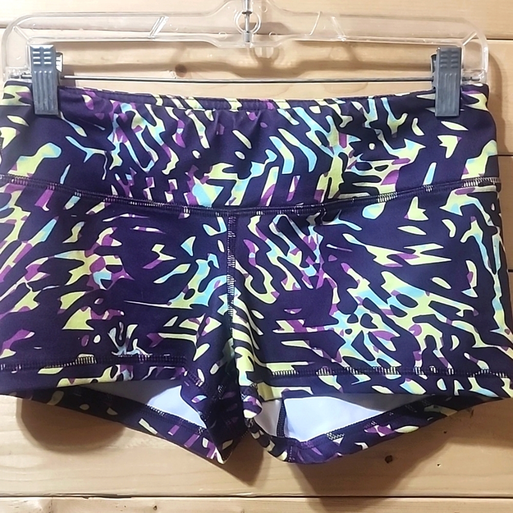Fleo OG cut rewards shorts, print is love potion. Size Medium